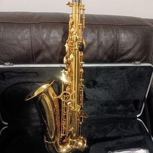 Brand new gold saxophone in case
